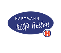1938 Logo HARTMANN teraz tvorí dominantný modrý ovál s menom a dôvetkom Hilf heilen - Pomáha liečiť, vo vnútri oválu