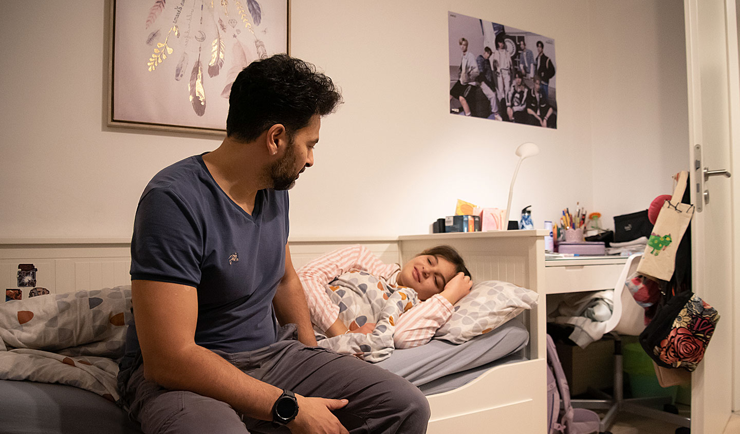 Family manager Rahman bringing his daughter to bed